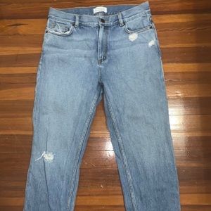 pair of blue jeans with minimal rips - size 5
